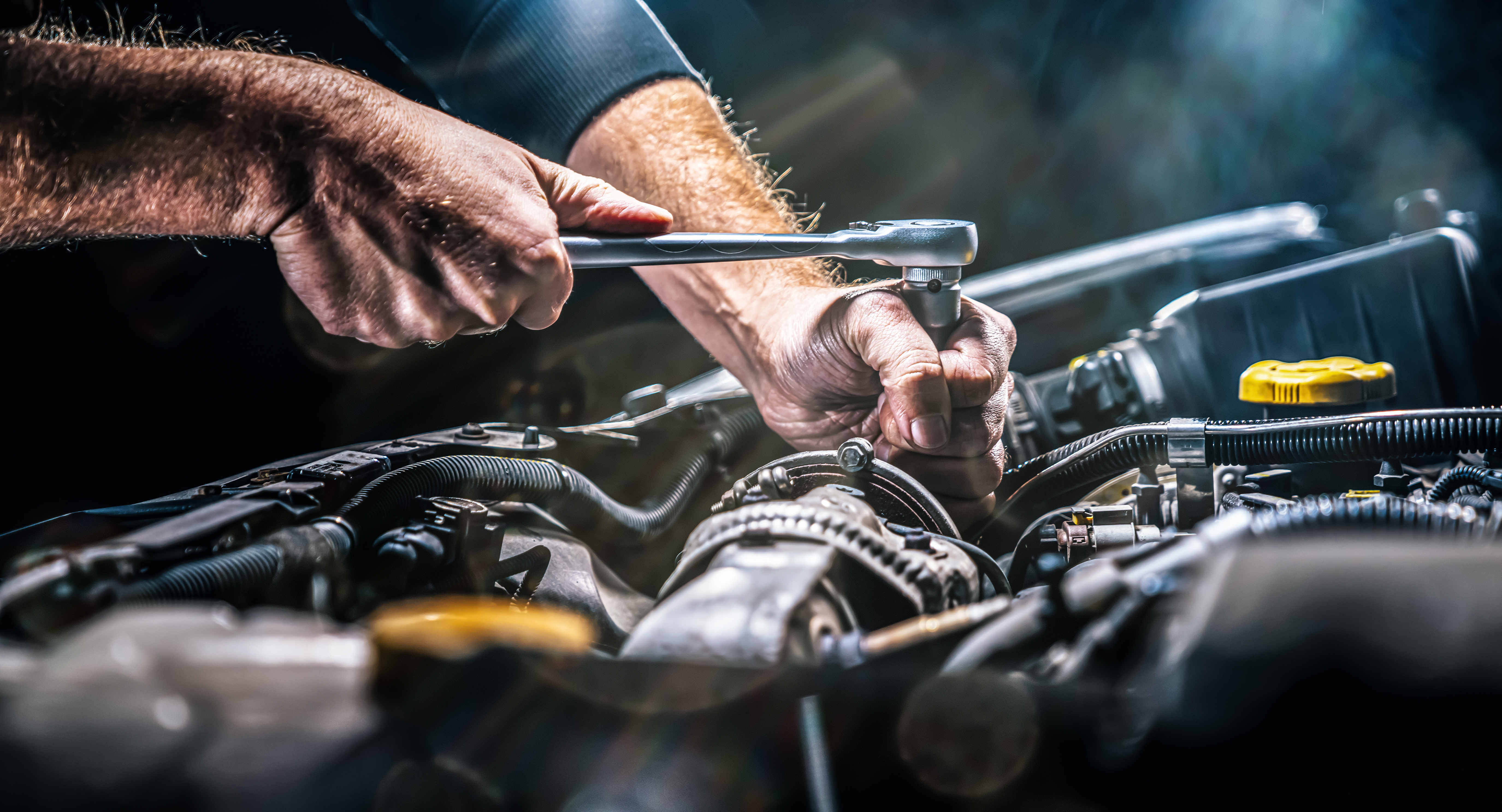 Mechanic Fixing Car